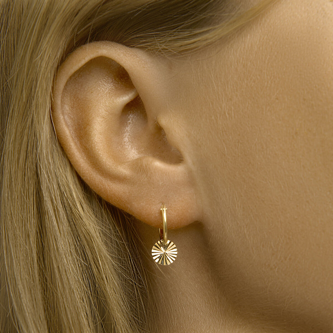 Runde Ohrringe aus 14-karätigem Gelbgold mit Diamanten