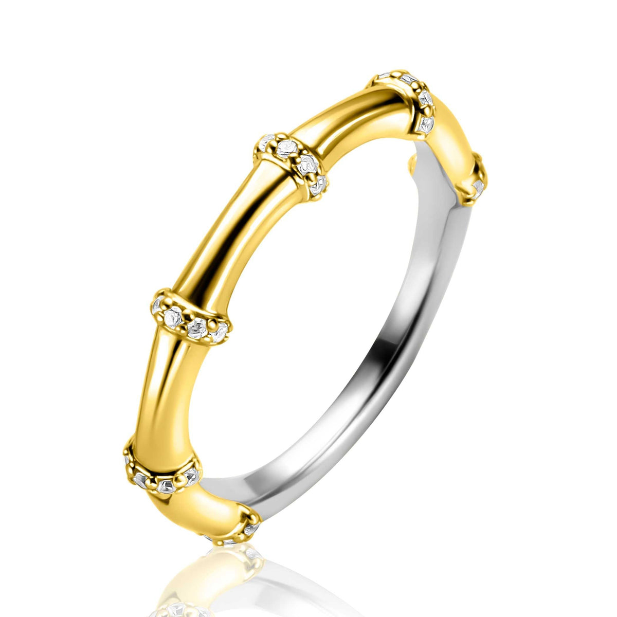 Ring aus Silber mit goldenen Elementen und kleinen, funkelnden Steinen