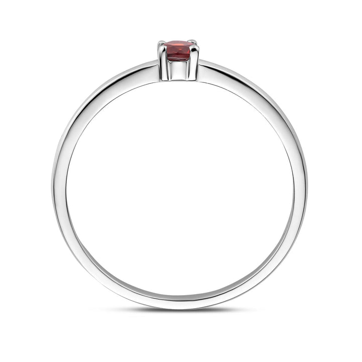 Een tijdloze Van der Kooij Collectie ring met geboortesteen granaat (januari), zilver gerhodineerd, met een klein ronde granaat in vierpoots zetting-een elegant dames sieraad.