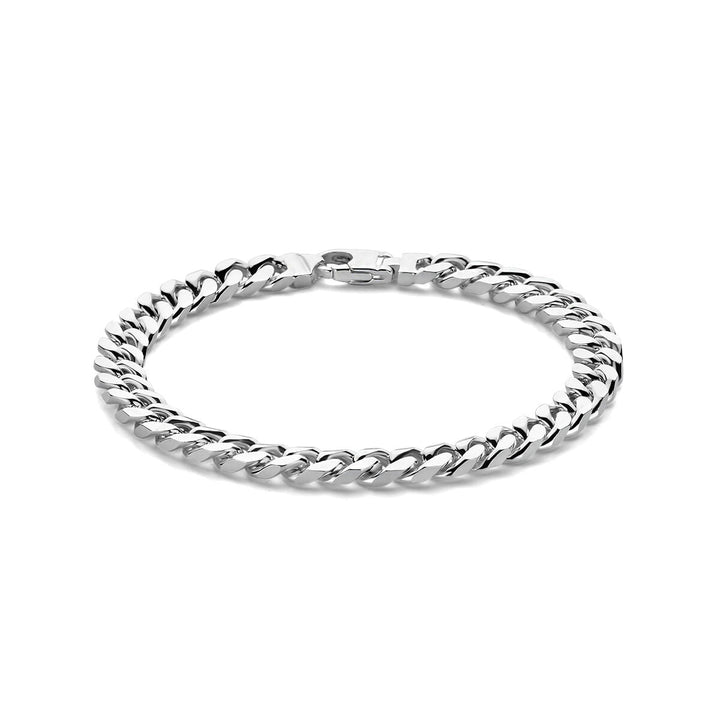 De Zilveren armband heren gourmette 7,0 mm van de Van der Kooij Collectie combineert een strak, gepolijst ontwerp met een gesp-sluiting en straalt tijdloze elegantie uit. Gepresenteerd tegen een witte achtergrond.