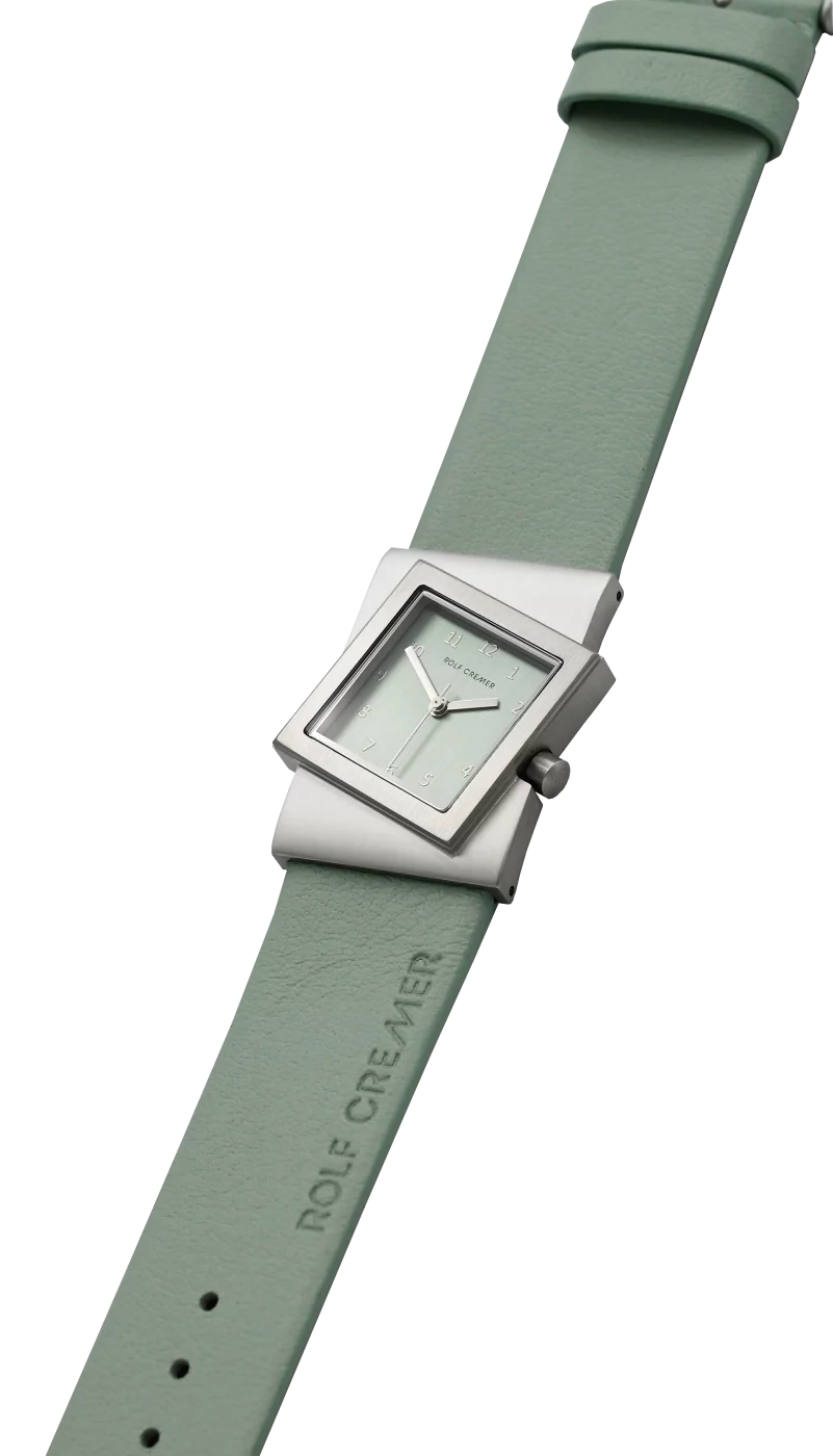 Uhr mit quadratischem Gehäuse, mintgrünem Zifferblatt und grauem Lederarmband