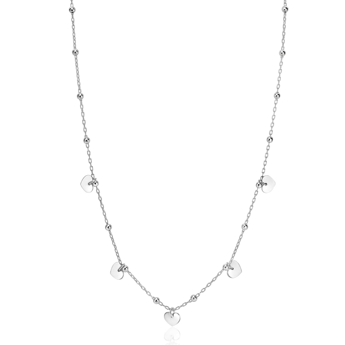 Kette aus Silber mit kleinen Herzanhängern und runden Perlen in gleichmäßiger Anordnung