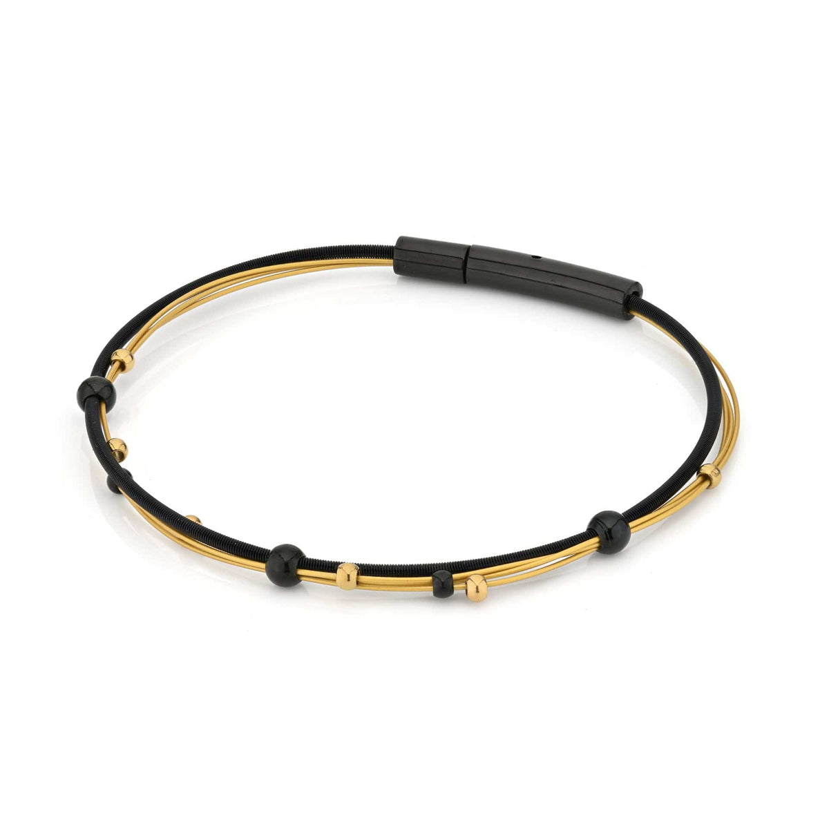 Armband mit schwarzen und goldenen Bicolor-Elementen und spielerischen Kugeln