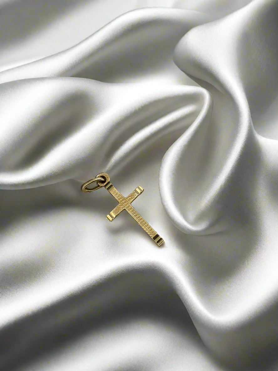 Vintage Hänger aus 14k Gold in Kreuzform mit feinen Details und glänzender Oberfläche
