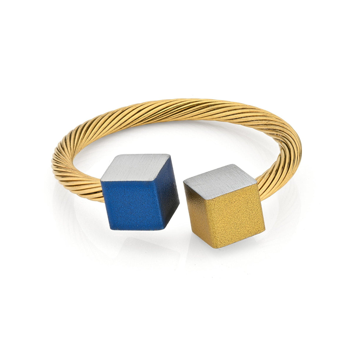 Ring mit goldfarbener, gedrehter Band und blauen sowie goldfarbenen Würfeln