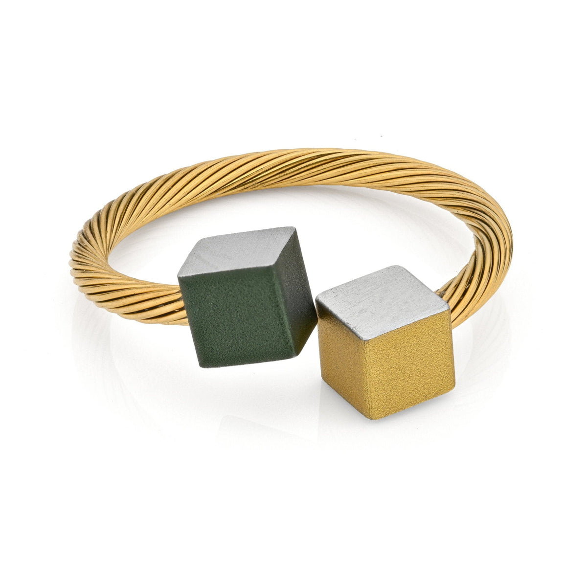 Ring mit goldfarbener Drehspirale und zwei kubischen Elementen in grün und goldfarben