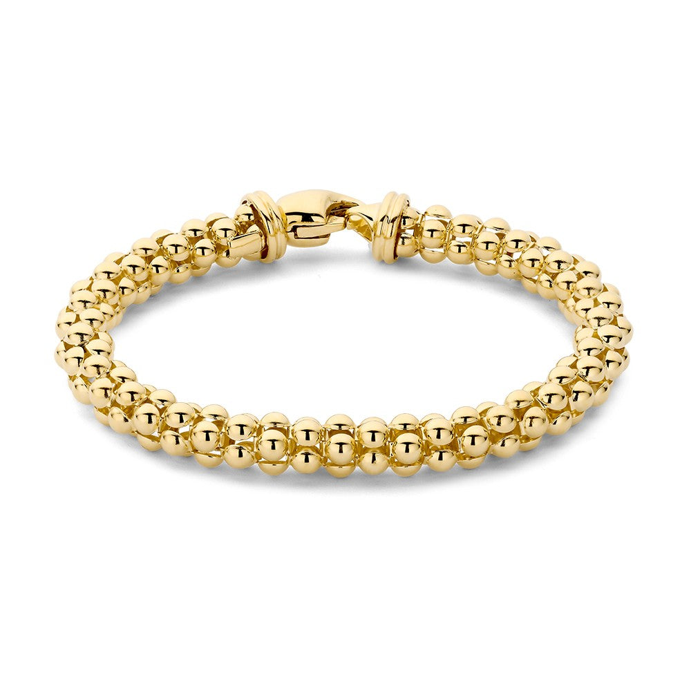Armband aus Gelbgold mit runden, glänzenden Perlen und einem Karabinerverschluss