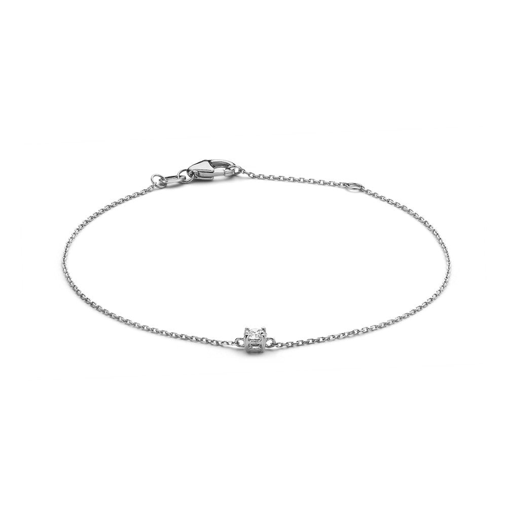 Armband aus Weißgold mit einem kleinen, funkelnden Diamanten in der Mitte