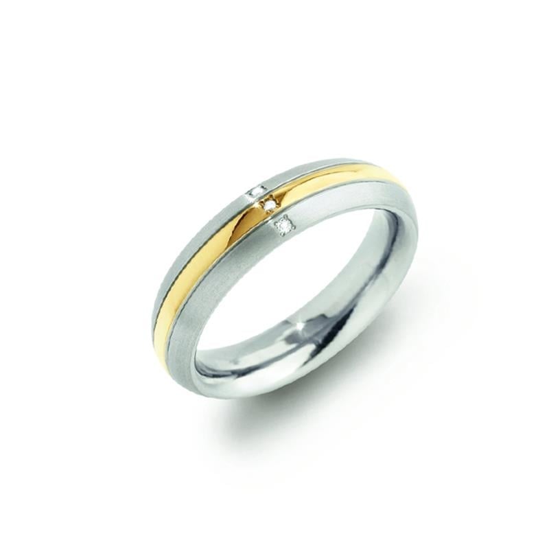 Bicolor Ring aus Titan mit silbernem und goldenem Band sowie zwei kleinen Diamanten