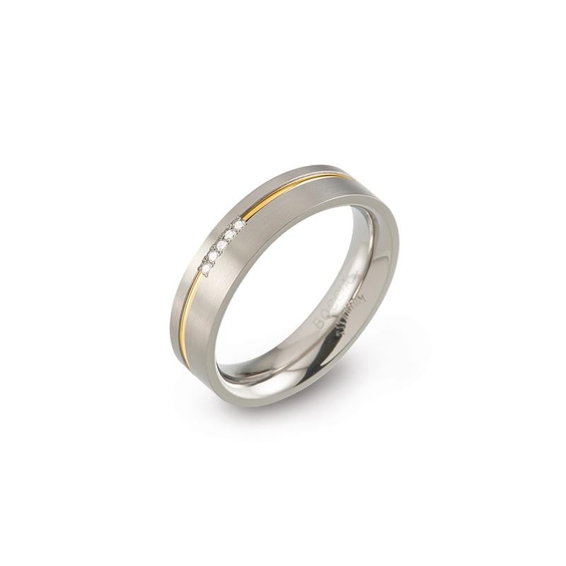 Bicolor Titanring mit glänzender Oberfläche und drei kleinen Zirkonia-Steinen