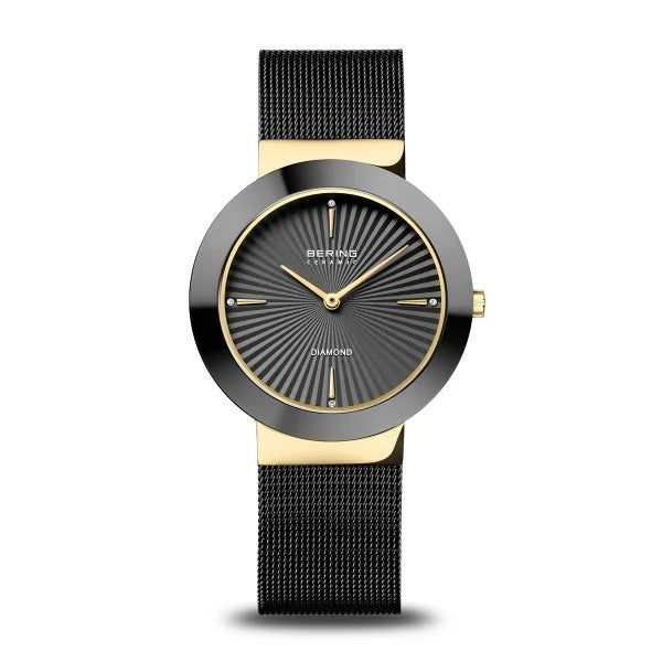 Damenarmbanduhr mit schwarzem Zifferblatt, goldfarbenem Gehäuse und Mesh-Armband, besetzt mit Diamantdetails
