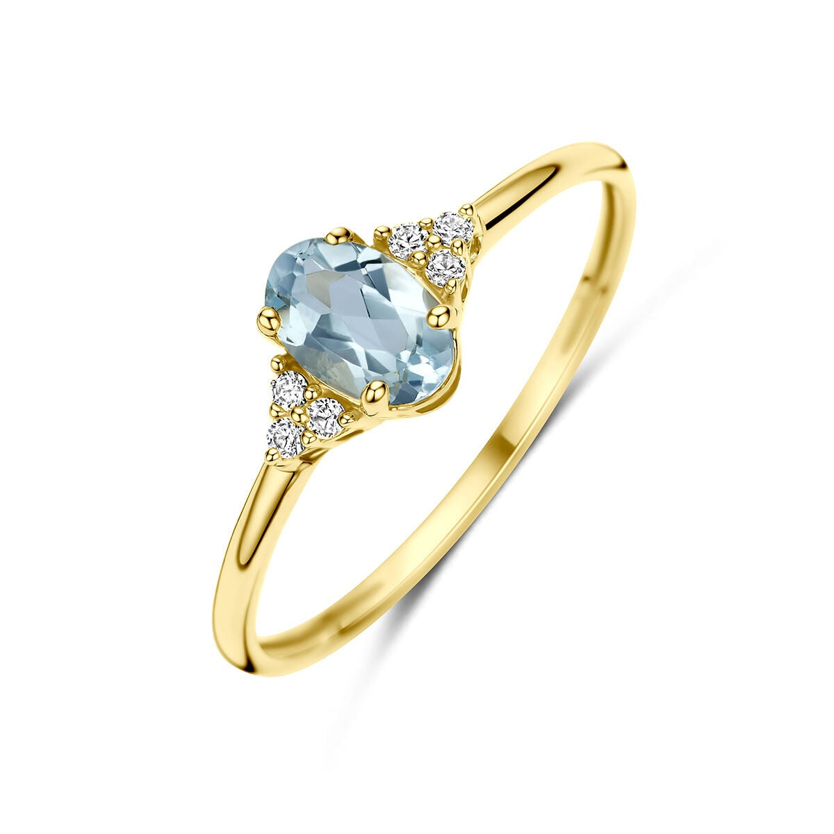 Ring aus 14k Gelbgold mit ovalem blauen Topas und Zirkonia-Steinen