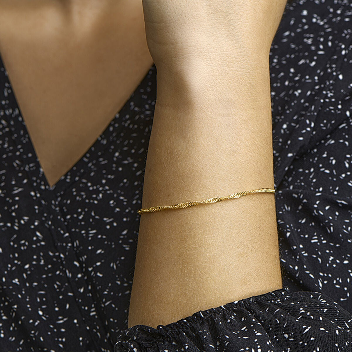 Goldenes Damenarmband 9k mit Singapur-Kette