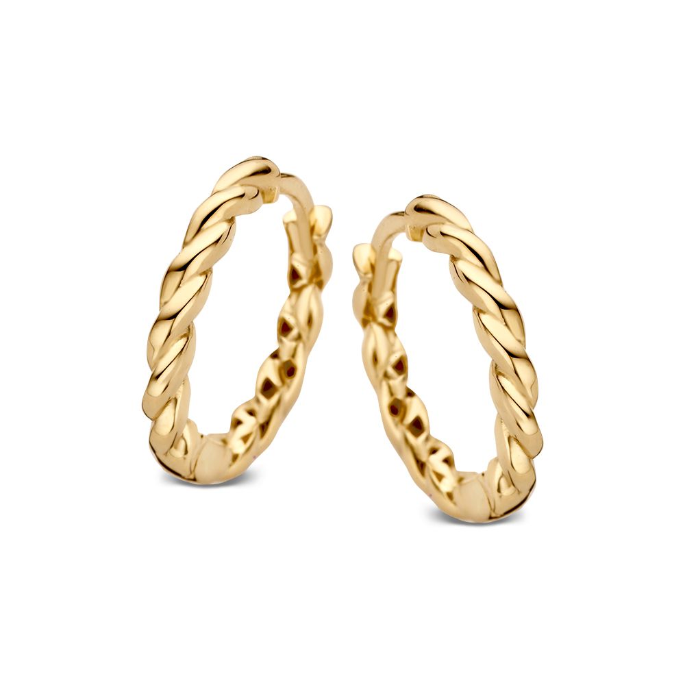 Gelbgoldene Creolen mit gedrehtem Design und glänzender Oberfläche
