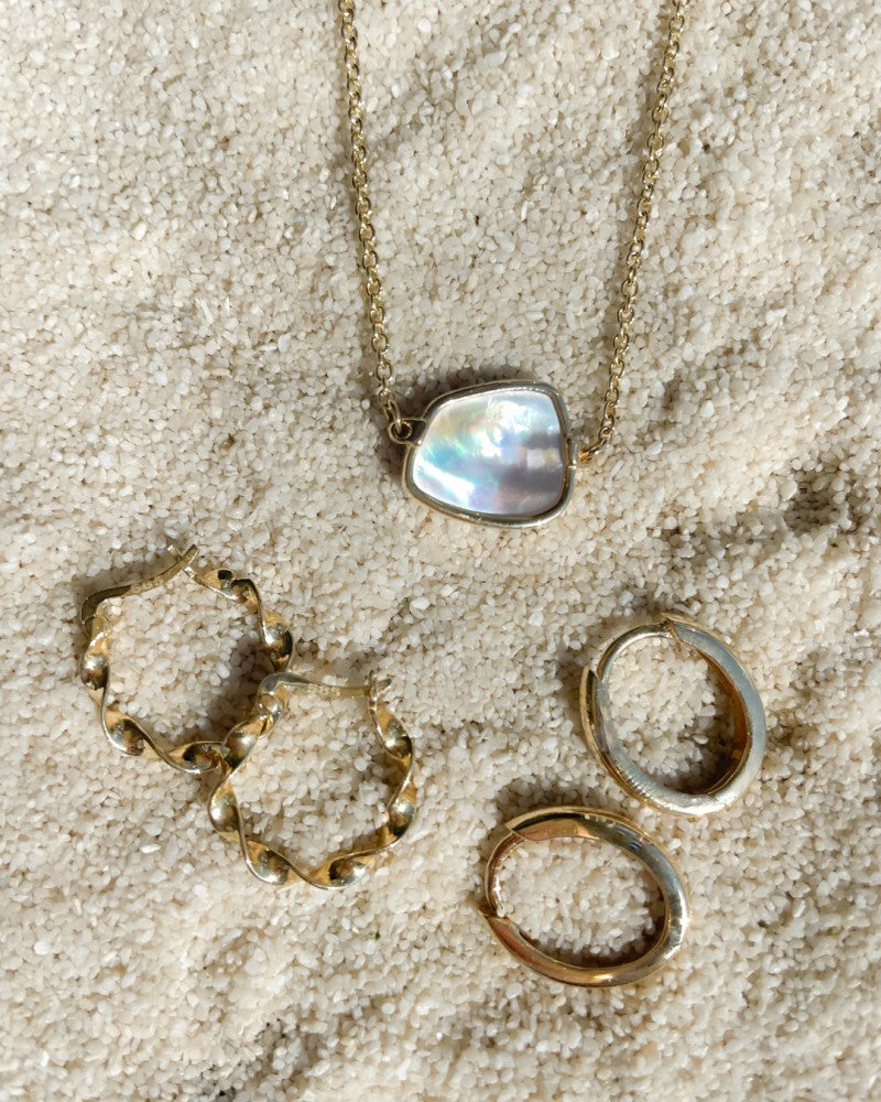 Gelbgoldene Ohrringe mit gedrehtem Design – Elegante Ohrringe für Damen | Van der Kooij