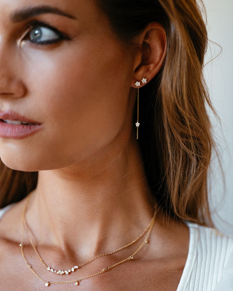 Verspielte Ohrstecker aus Gelbgold mit Sternschnuppen und Diamanten von 0,24 Karat