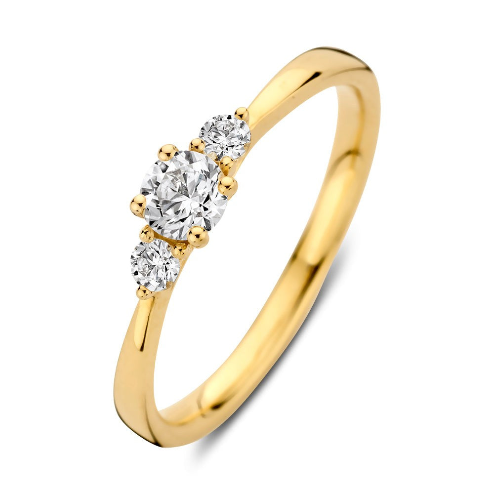 Ring aus 18 Karat Gelbgold mit drei Diamanten, zwei runden und einem ovalen, in der Mitte.