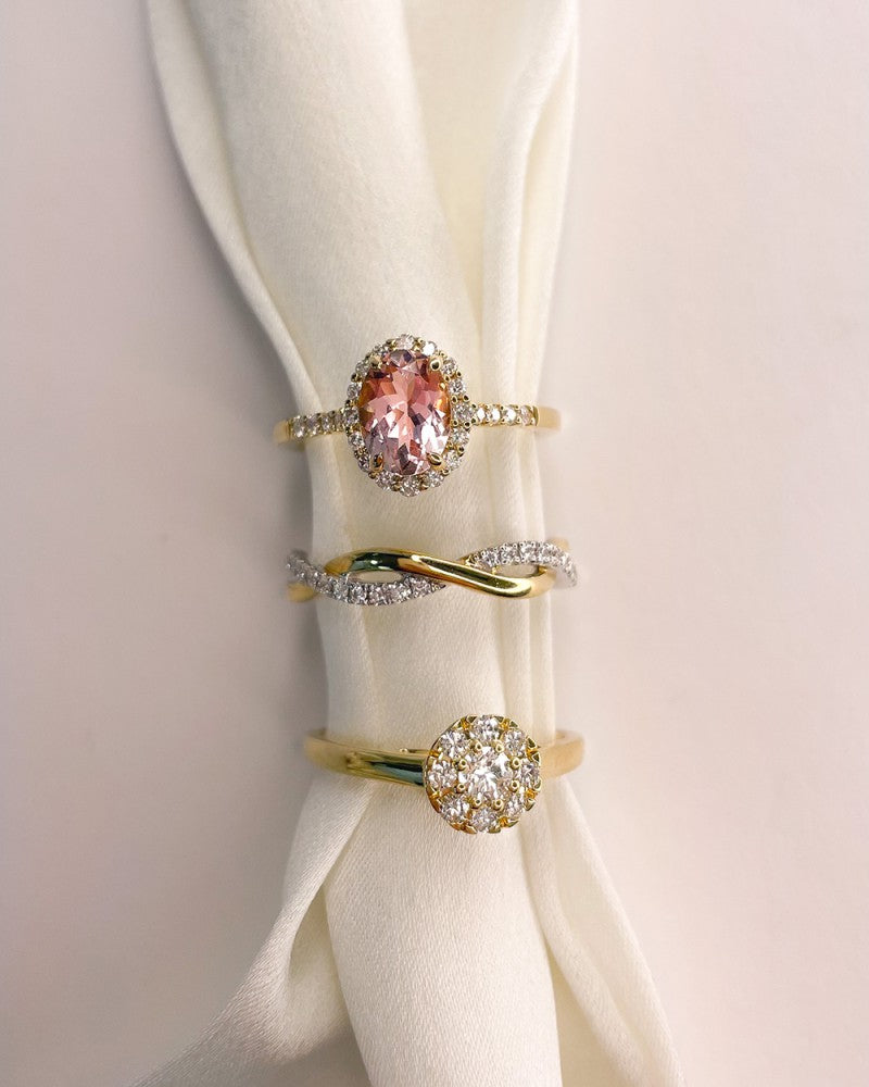 Bicolor-Goldring mit Twist-Design und Diamanten – 0,27 Karat
