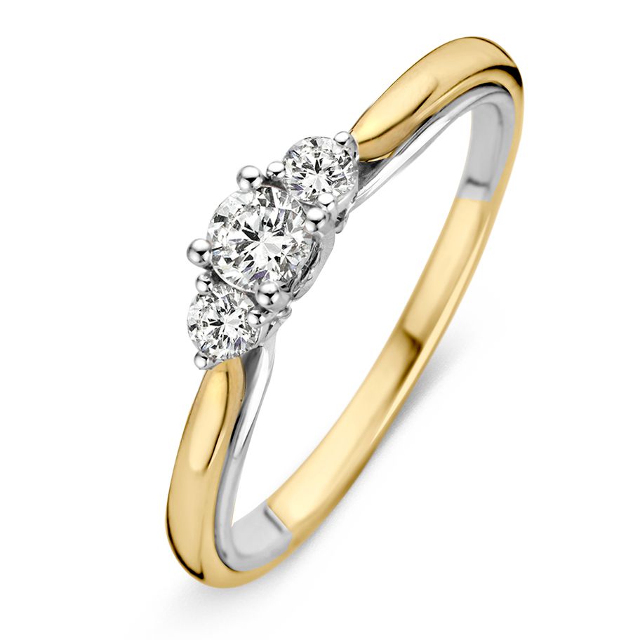 Bicolor Ring aus Gelbgold und Weißgold mit drei Brillanten, insgesamt 0,31 ct