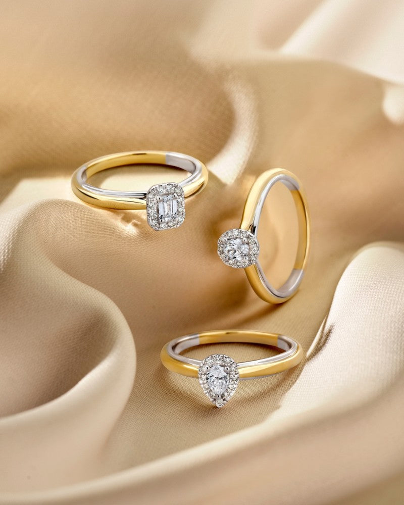 14k Bicolor Goldring mit birnenförmigem Diamanten in Entourage-Fassung