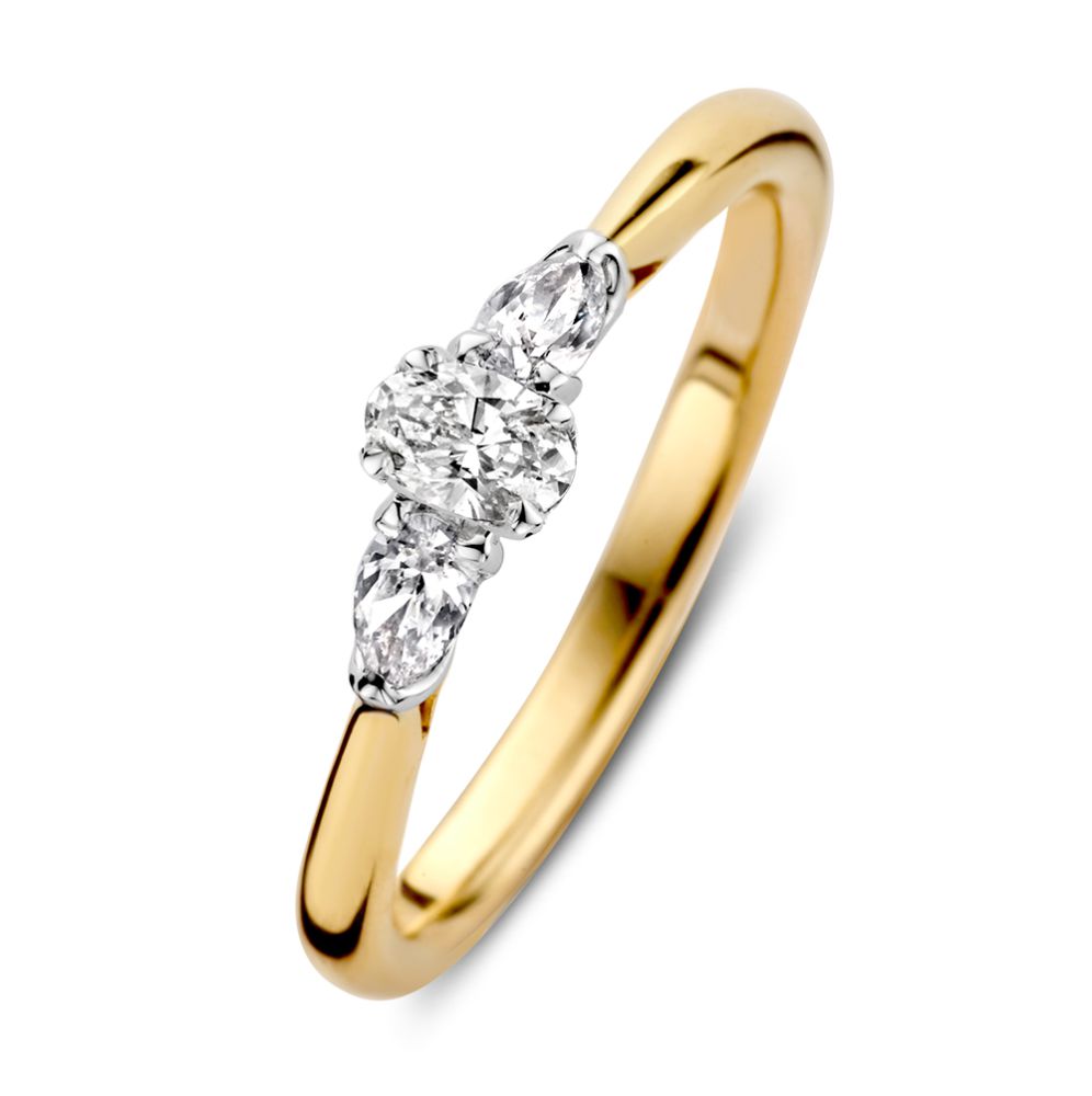 Bicolor Goldring mit ovalem Diamanten in der Mitte und zwei tropfenförmigen Diamanten an den Seiten