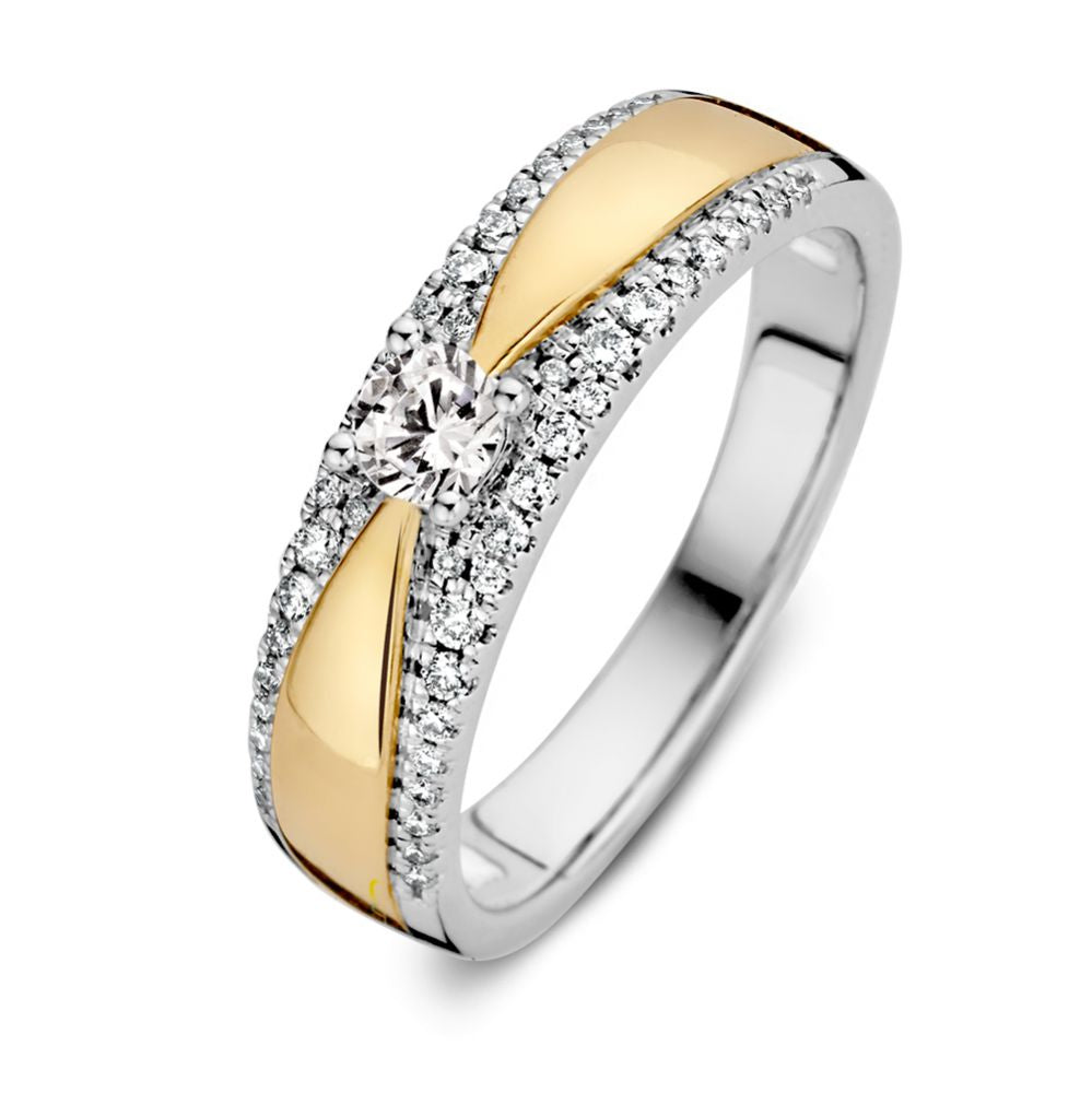 Bicolor Damenring aus Gelb- und Weißgold mit einem zentralen Diamanten und kleinen Brillanten