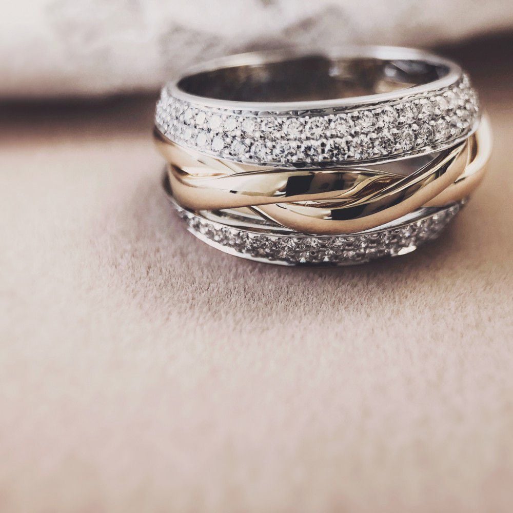 Bicolor Goldring mit Brillanten 0.87ct H/SI-1 14 Karat