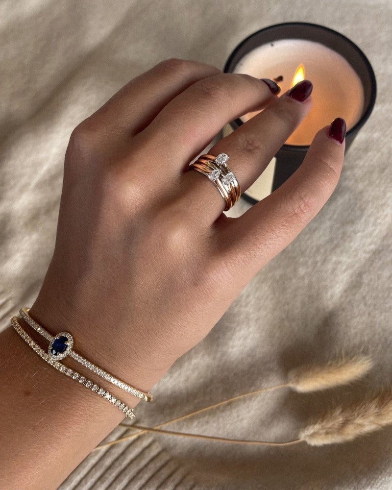 14k Gold Bicolor Solitärring mit tropfenförmigem Diamant 0.23ct
