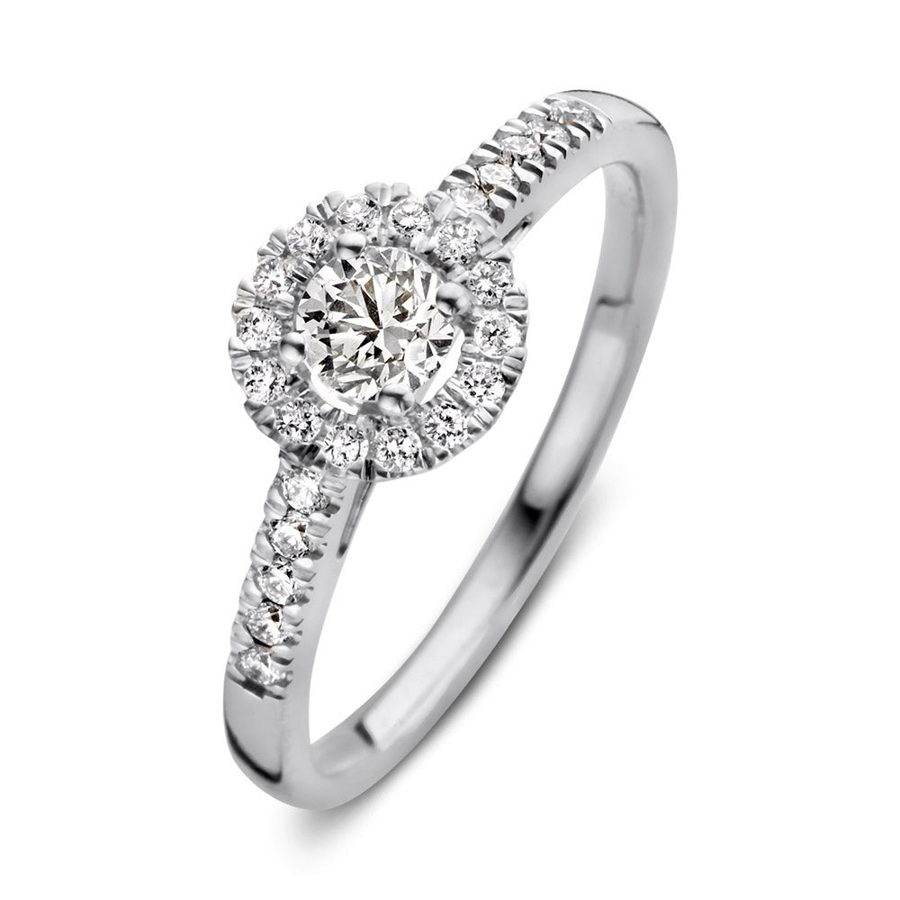 Ring aus Weißgold mit rundem, funkelndem Diamanten und kleinen, eingesetzten Steinen