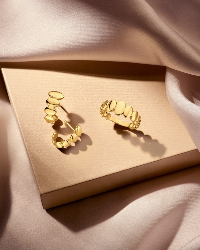 Gelbgoldring mit außergewöhnlichem Design aus ovalen Kugeln – 14 Karat Luxus für Damen