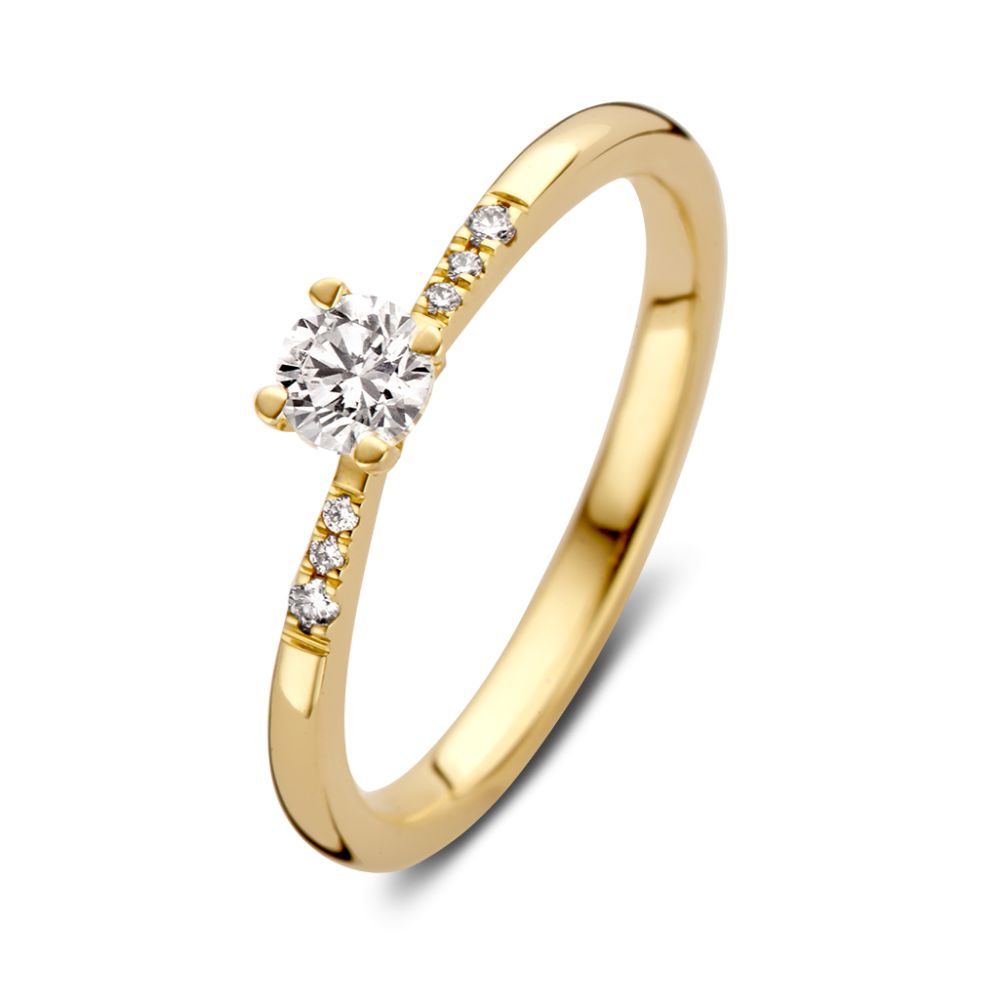 Eleganter Ring aus 14-karätigem Gelbgold mit brillantem Diamanten und kleinen seitlichen Steinen