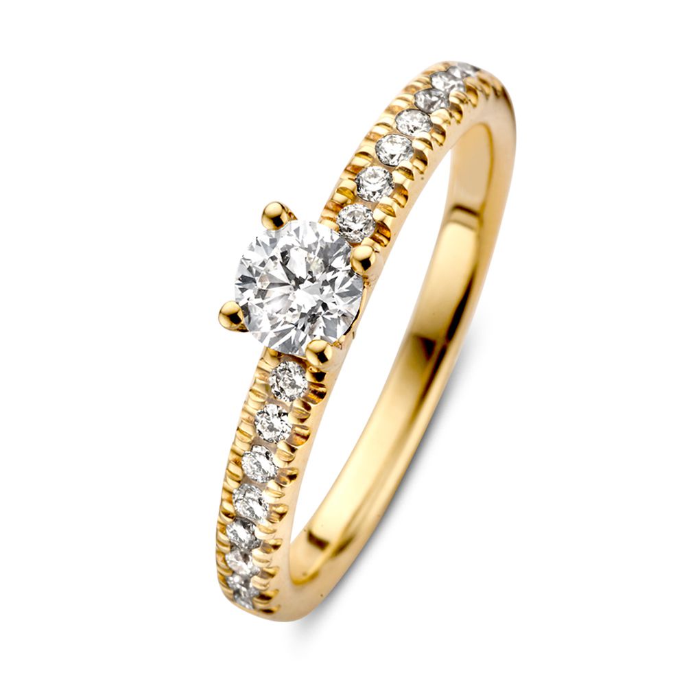 Eleganter Ring aus 14-karätigem Gelbgold mit einem Brillanten und kleinen Diamanten am Band
