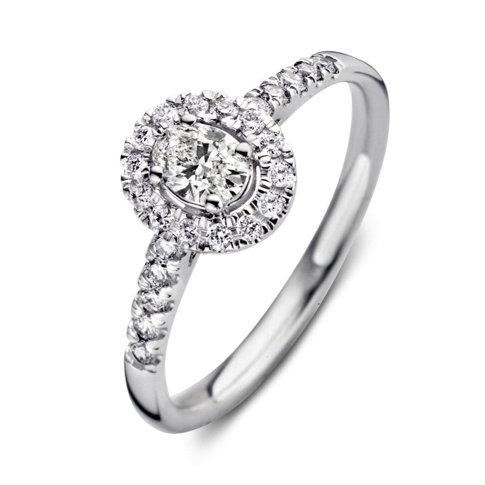 Ring aus Weißgold mit ovalem Zifferblatt und 0,50 ct Diamanten, umgeben von kleinen Brillanten