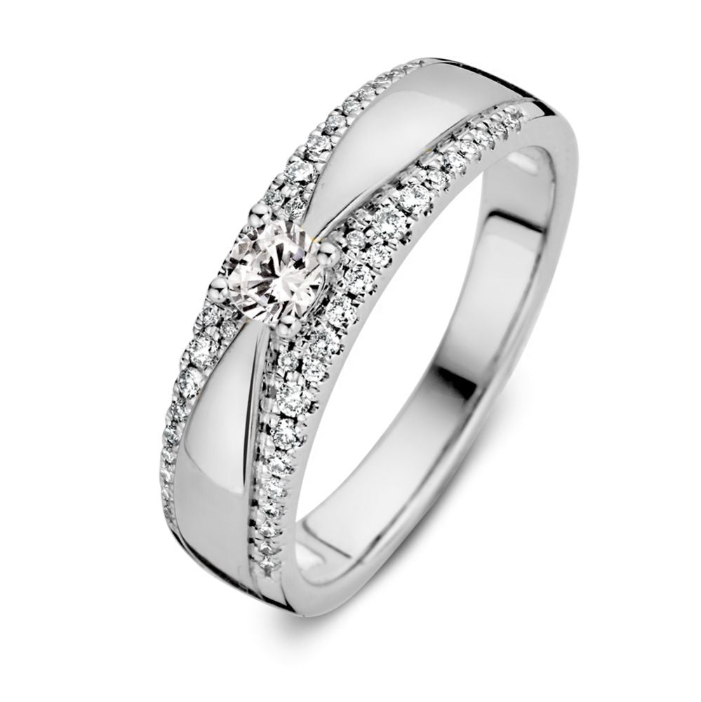 Weißgoldring mit 0,40 Karat Brillant und funkelnden Zirkonia entlang der Fassung