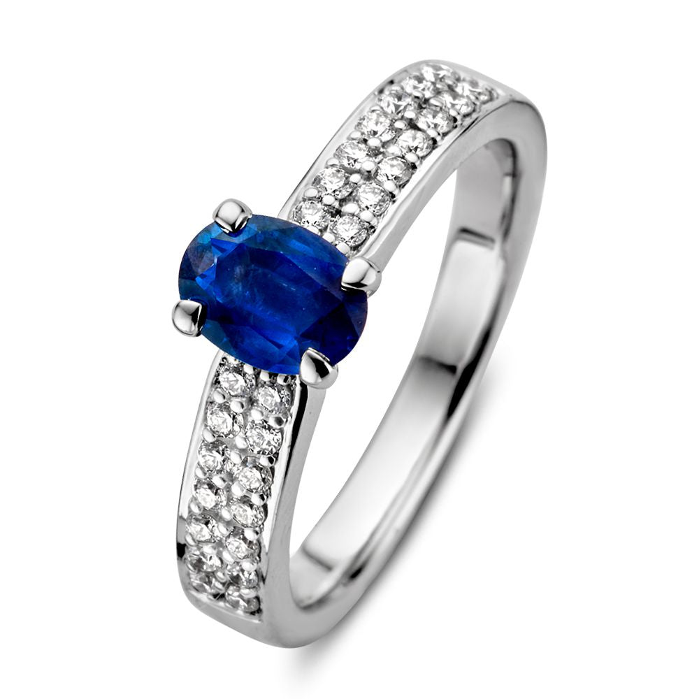 Ring aus Weißgold mit blauem Saphir und Diamanten auf der Fassung