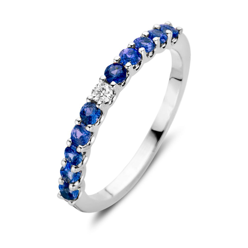 Ring aus Weißgold mit blauen Saphiren und einem weißen Brillanten, schlichte Form