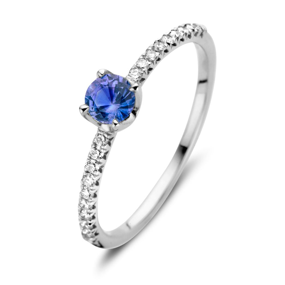 Ring aus 18kt Weißgold mit blauem Saphir und 0,15ct Diamanten am Band