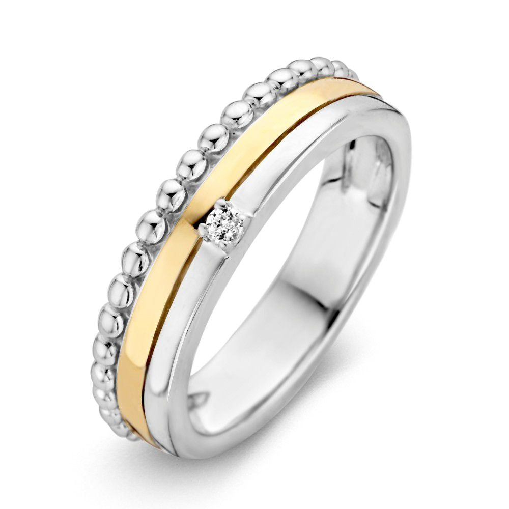 Ring aus Silber und Gold mit Zirkonia und strukturiertem Band.