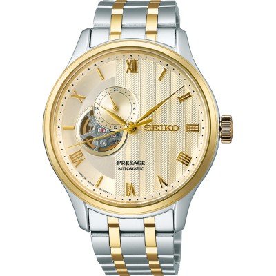 Herrenarmbanduhr mit goldfarbenem Zifferblatt, silbernem und goldfarbenem Gehäuse sowie Automatikwerk