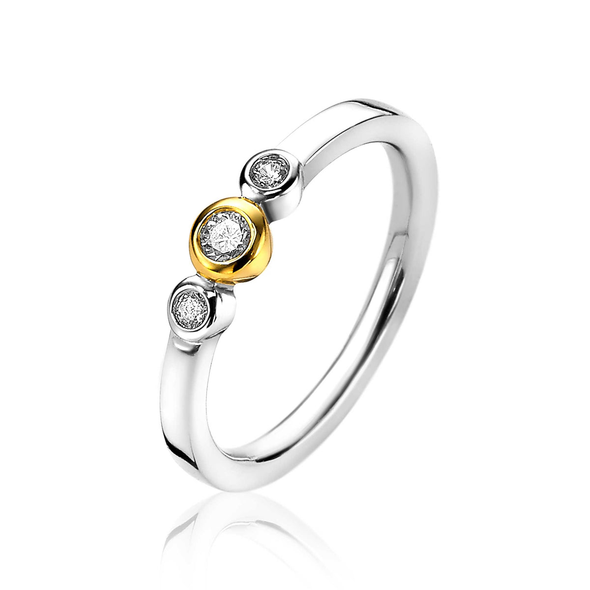 Ring aus vergoldetem Silber mit drei Zirkonia, zwei in Silber und einer in Gold.