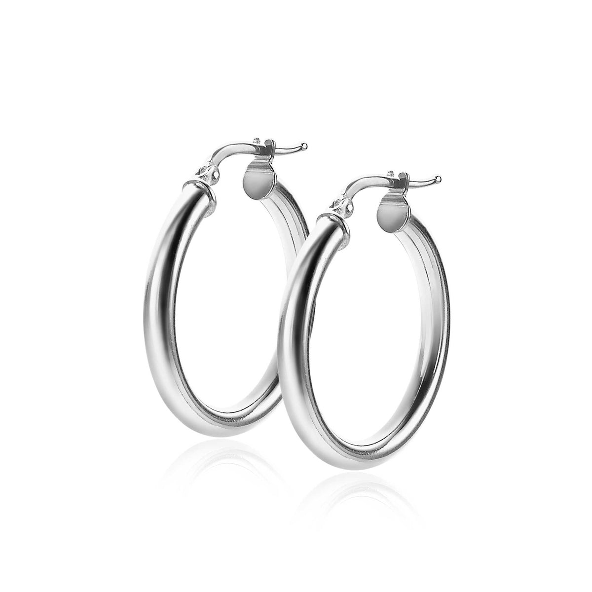 Ohrringe aus Silber in kreisförmiger Form mit glänzender Oberfläche