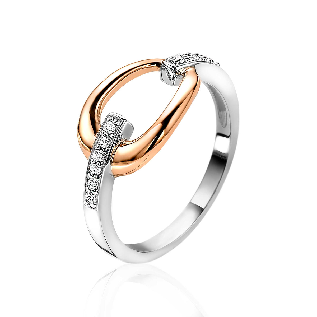 Ring aus vergoldetem und silbernem Metall mit Zirkonia-Steinen und geschwungener Form