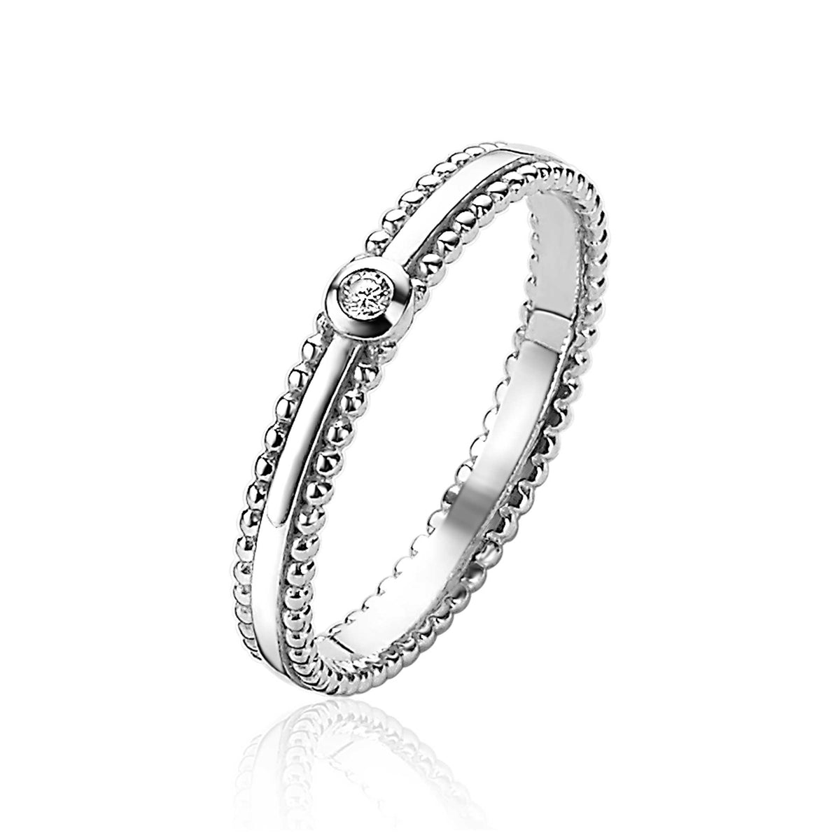 Ring aus Silber mit einem kleinen, funkelnden Edelstein und feiner Perlenstruktur