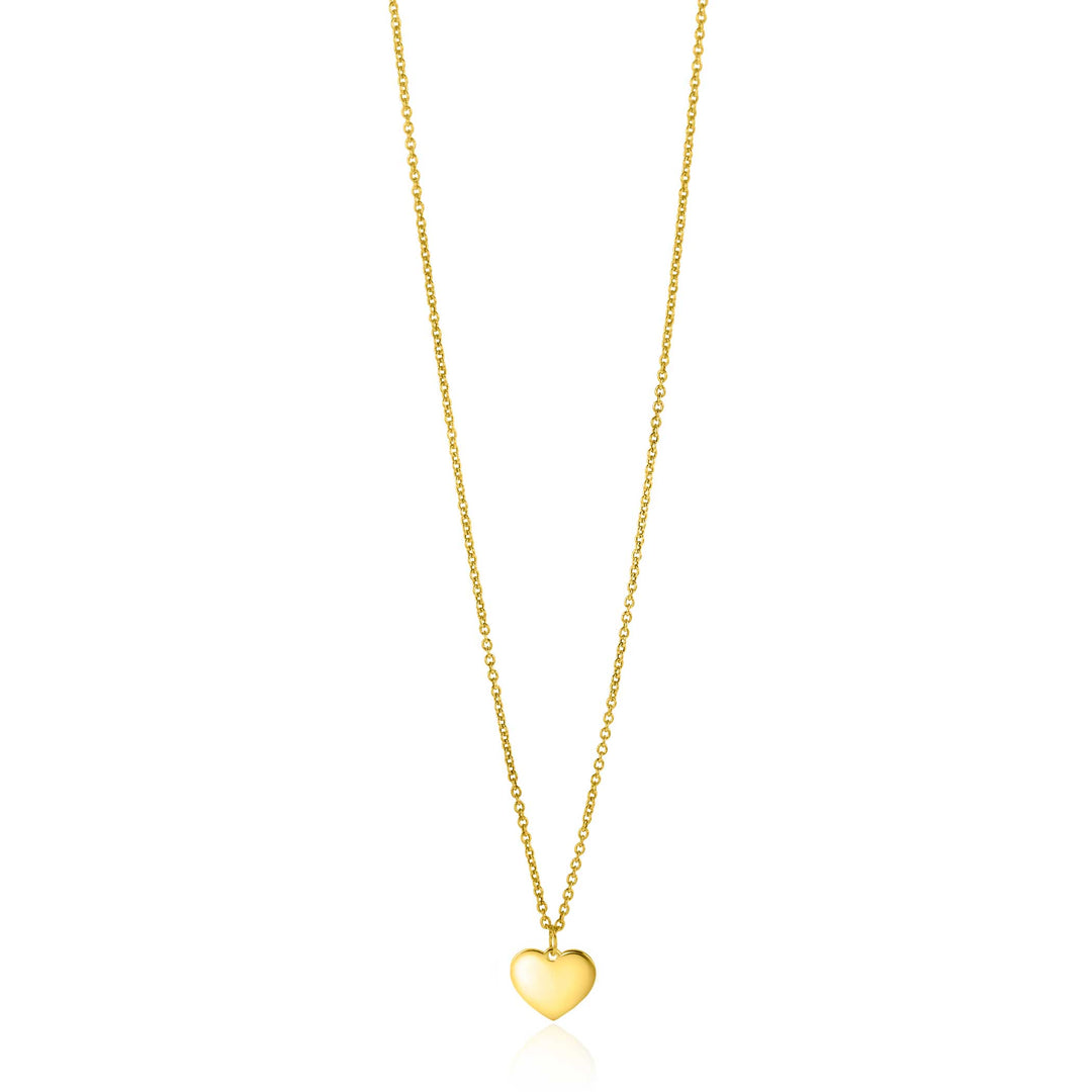 De Zinzi Ketting Goud Zgc312 uit de prestigieuze Zinzi Gold collectie is een delicate goud-ketting met een gladde hartvormige hanger, elegant gepresenteerd tegen een onberispelijk witte achtergrond, en belichaamt tijdloze elegantie en charme.