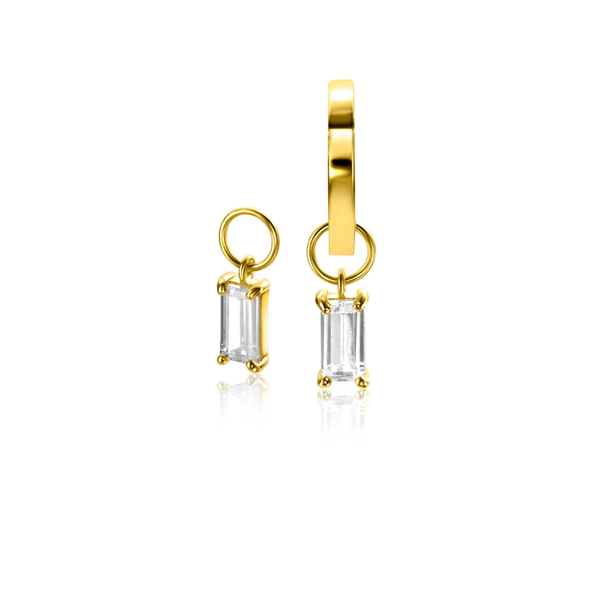 Goldene Ohrringe mit rechteckigem, transparentem Edelstein und einem kleinen Anhänger