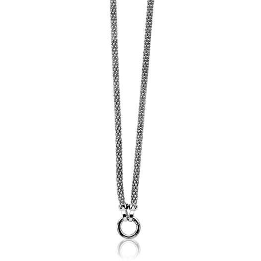 Silberne Kette mit feinem Mesh-Armband und runder Anhänger.